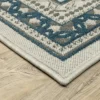 Trinity Classic Border Patio Area Rug Beige/Blue - Captiv8e Designs -Decor Haven Shop GUEST 65c34ffd de9e 4c3a afaa c74c1e042ad9