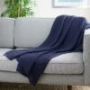 Larza Throw Blanket - Safavieh -Decor Haven Shop GUEST 79d3114c a2e4 4fc2 b765 0789fbce33b0