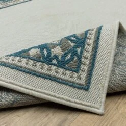 Trinity Classic Border Patio Area Rug Beige/Blue - Captiv8e Designs -Decor Haven Shop GUEST fb85a13e f16c 42b0 ac9c 5a95cbfc6b50